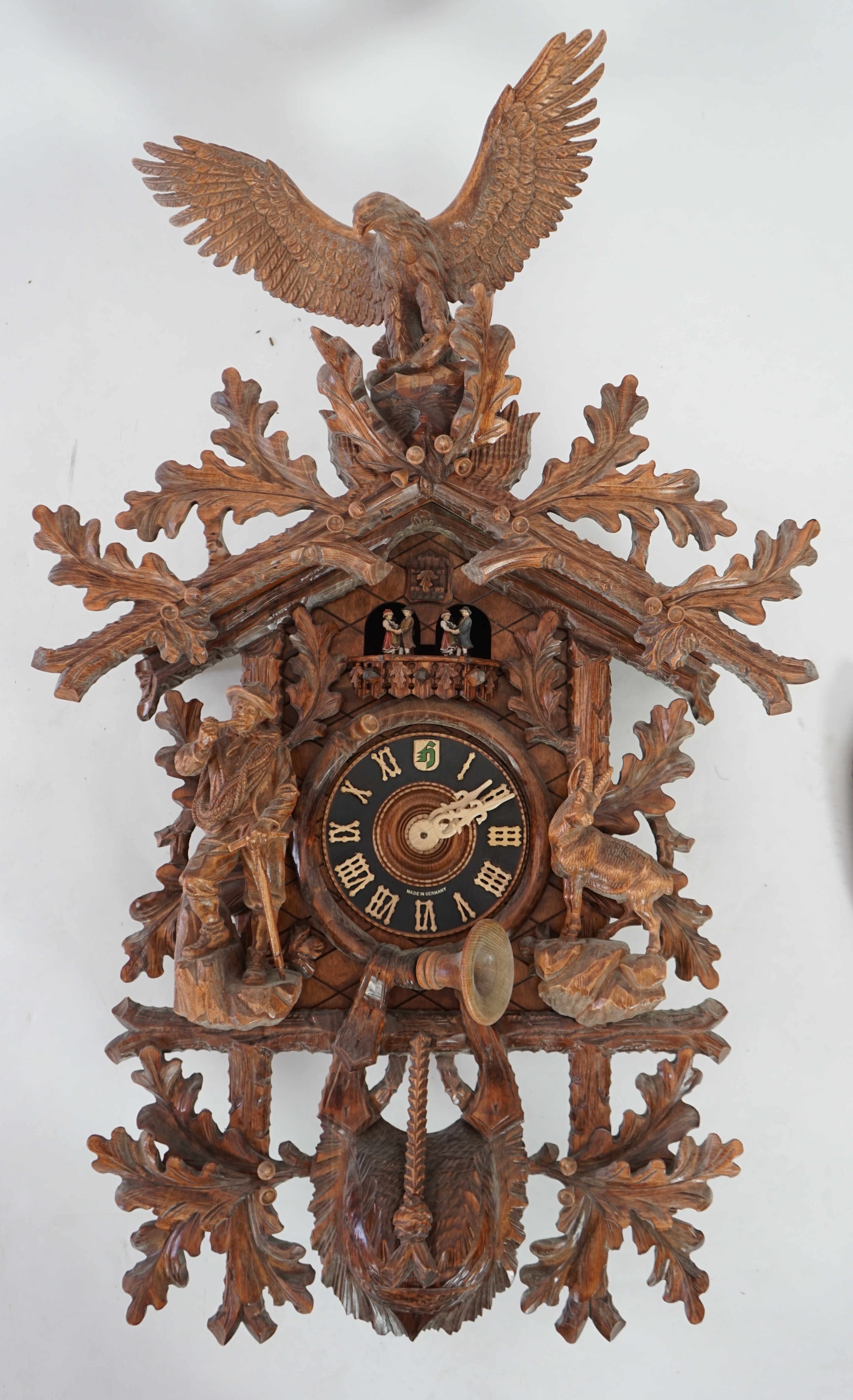 A Hönes Black Forest carved wood cuckoo clock
